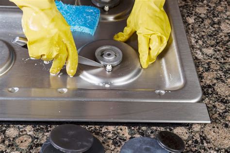 how to clean gas stove burner holes